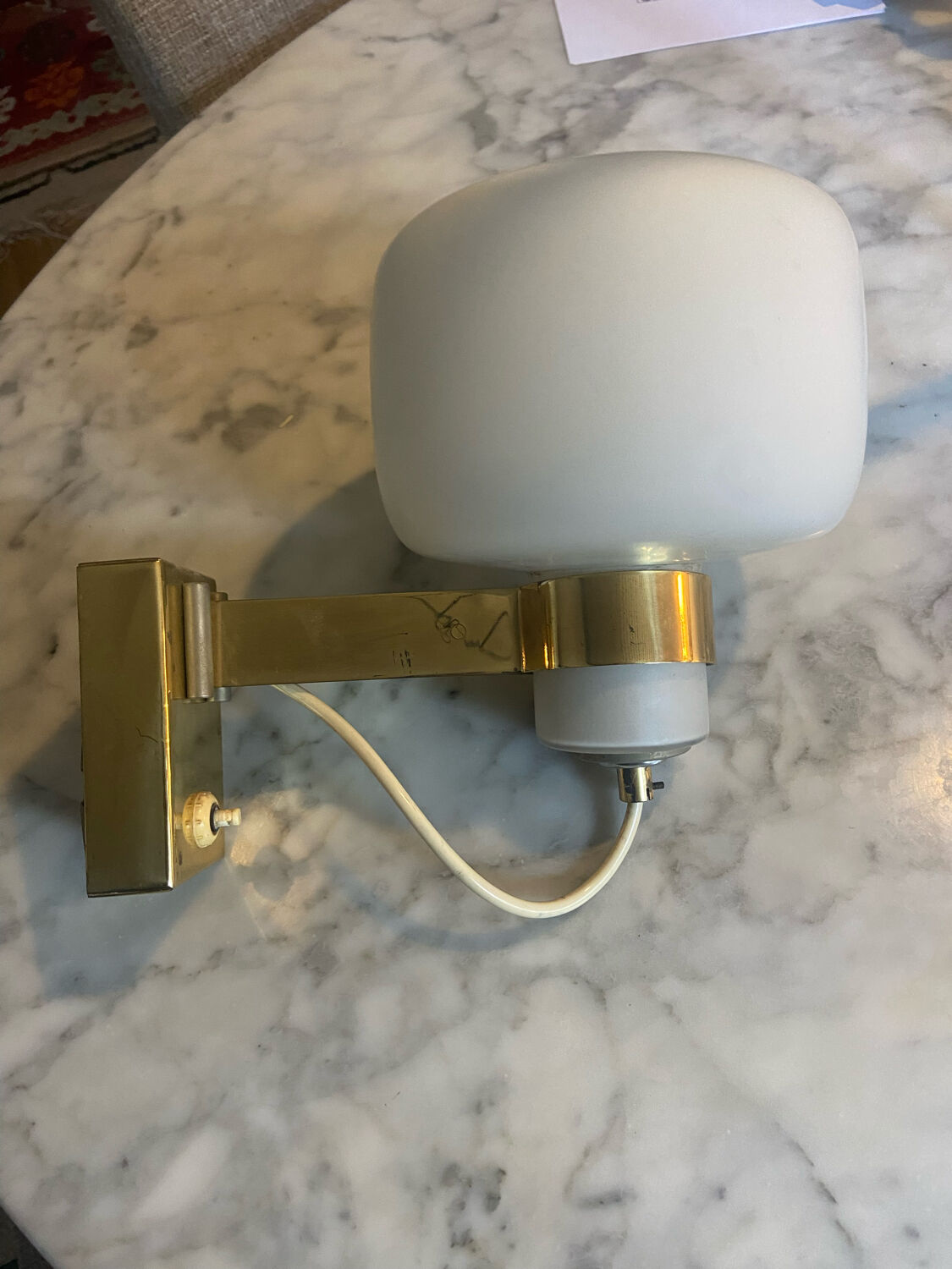 Vintage opaline and brass wall lamp