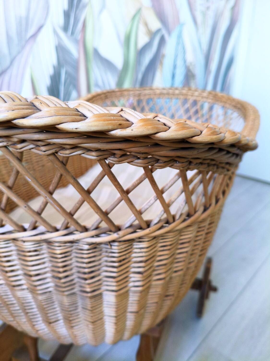 Wicker cradle on wheels