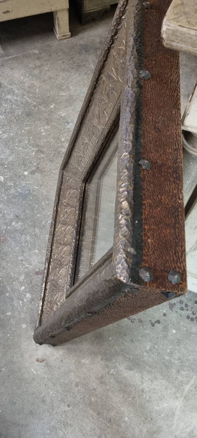 Early 20th century mirror made of stamped sheet metal