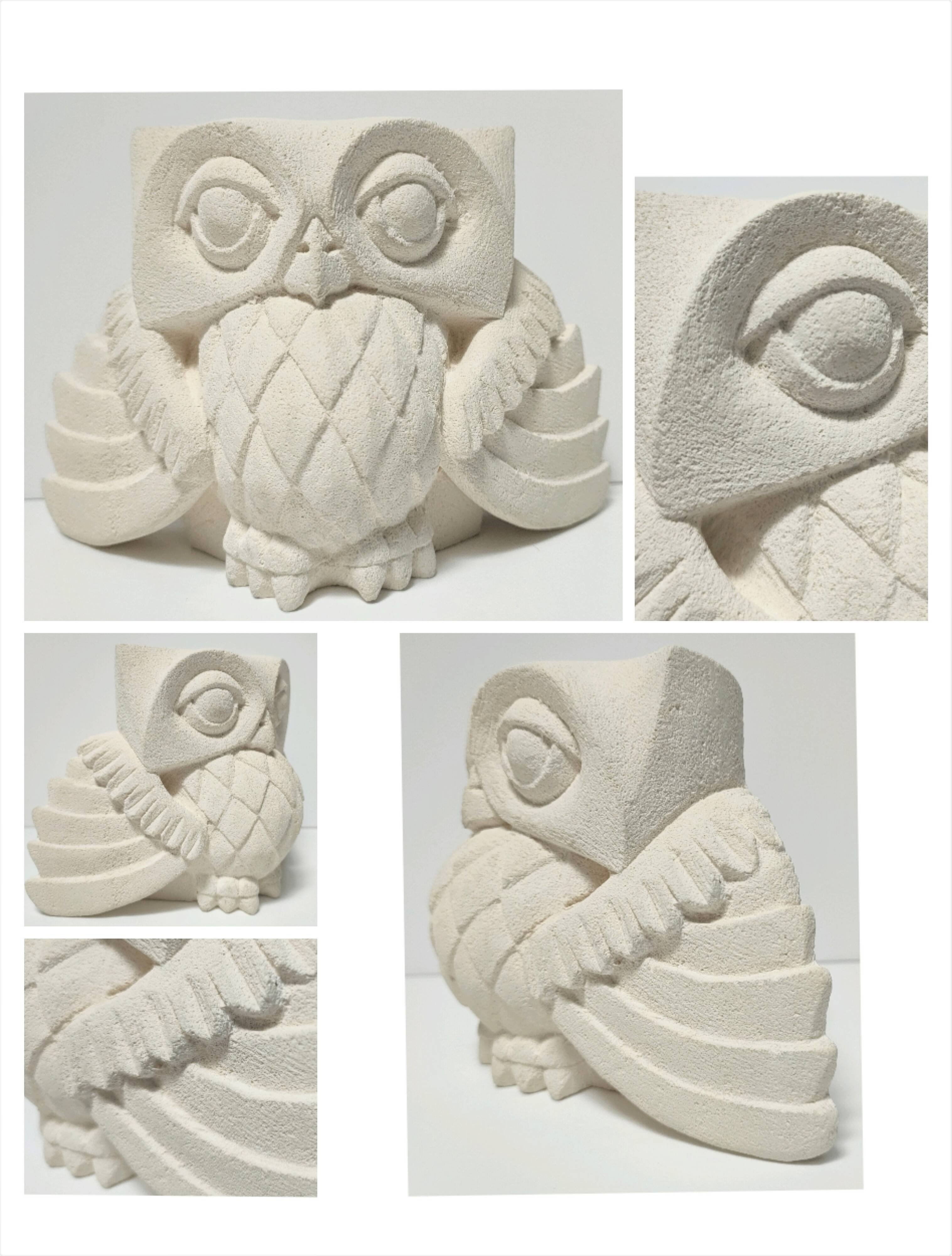 Signed stone owl sculpture