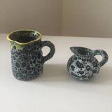 Set of two small Vallauris yellow and black milk jugs