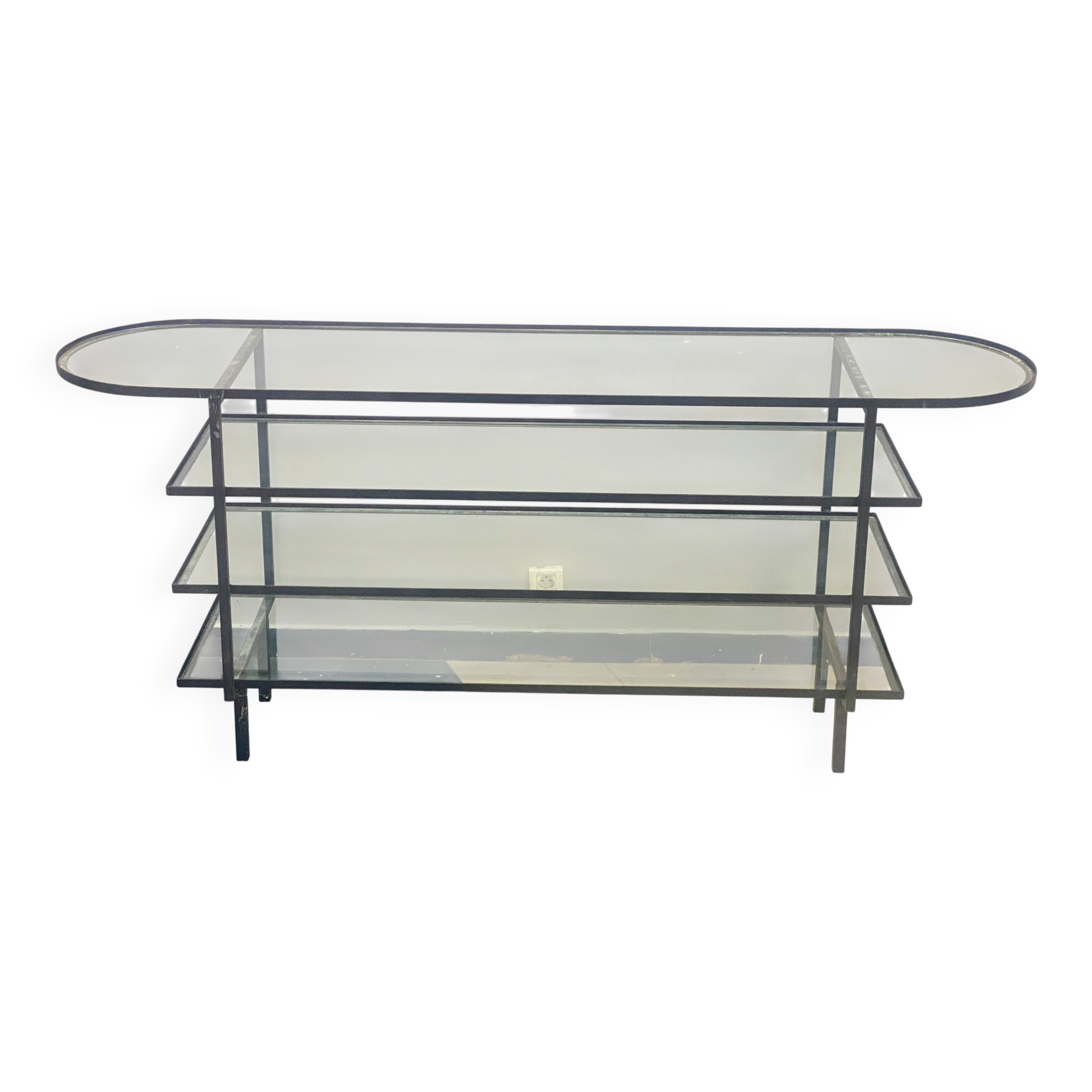 Mid-century console with glass top and metal frame.