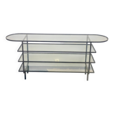 Mid-century console with glass top and metal frame.