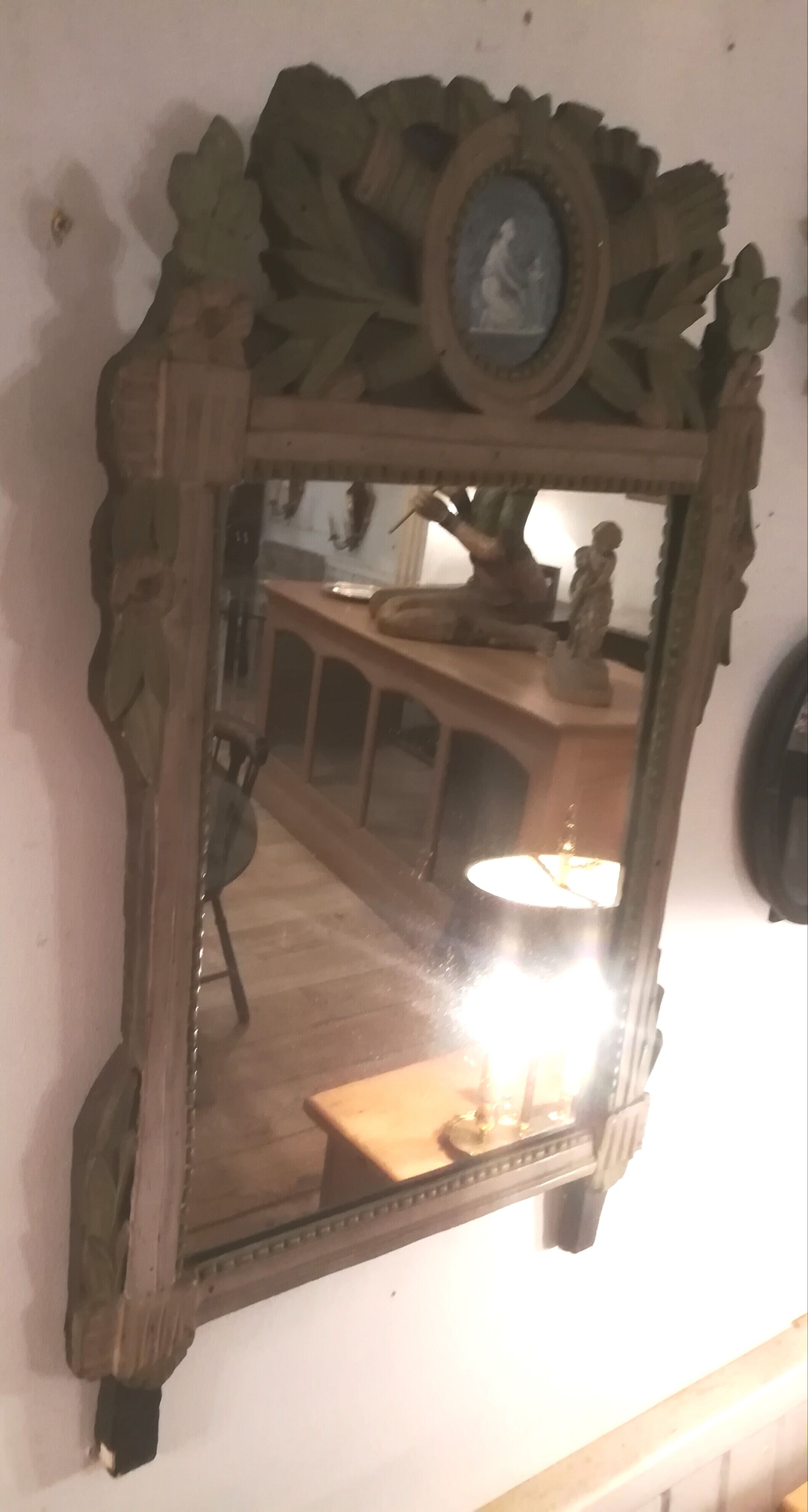 Louis XVI period mirror in patinated wood - 84x51cm