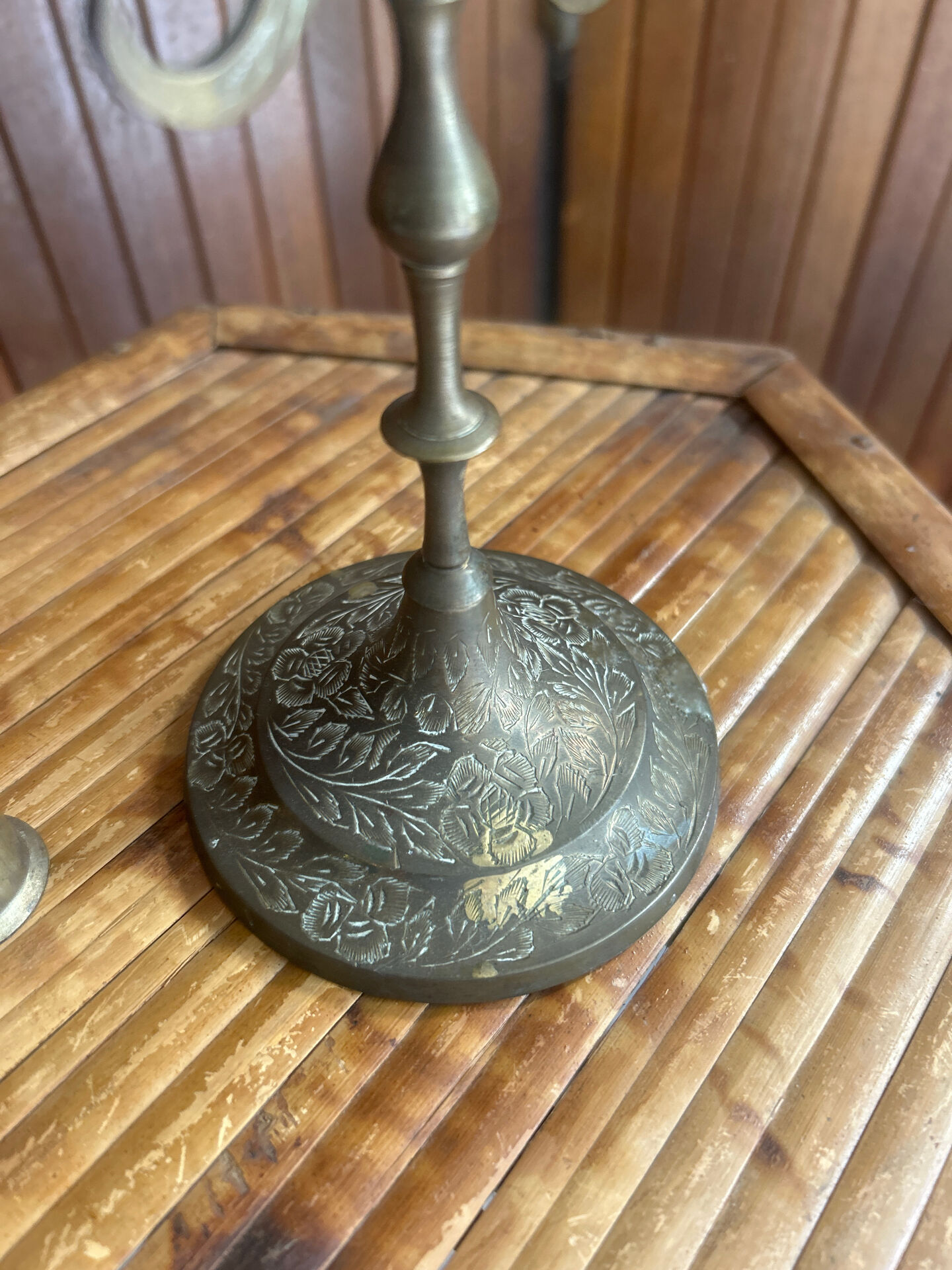 Vintage brass candelabrum engraved with three lights and a snuffer.