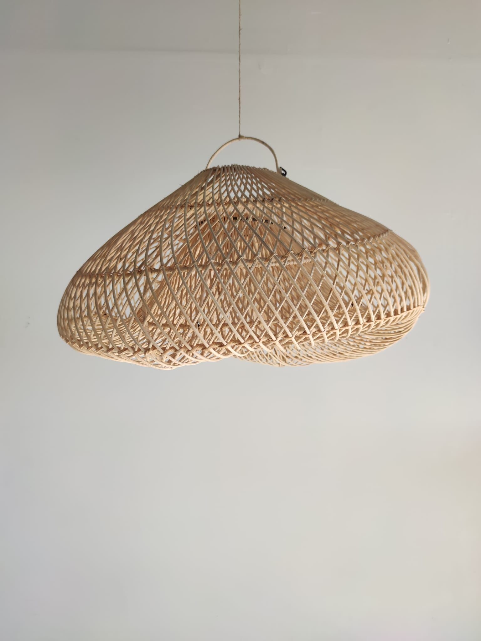 Small rattan lampshade in the shape of a braided hat