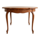 Round extendable oak dining table