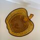 Amber glass dessert service in the shape of an apple made in Italy.