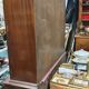 English showcase, two bodies, solid mahogany an of the 50s