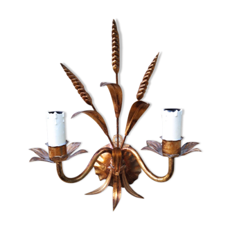 Sconce in gold metal