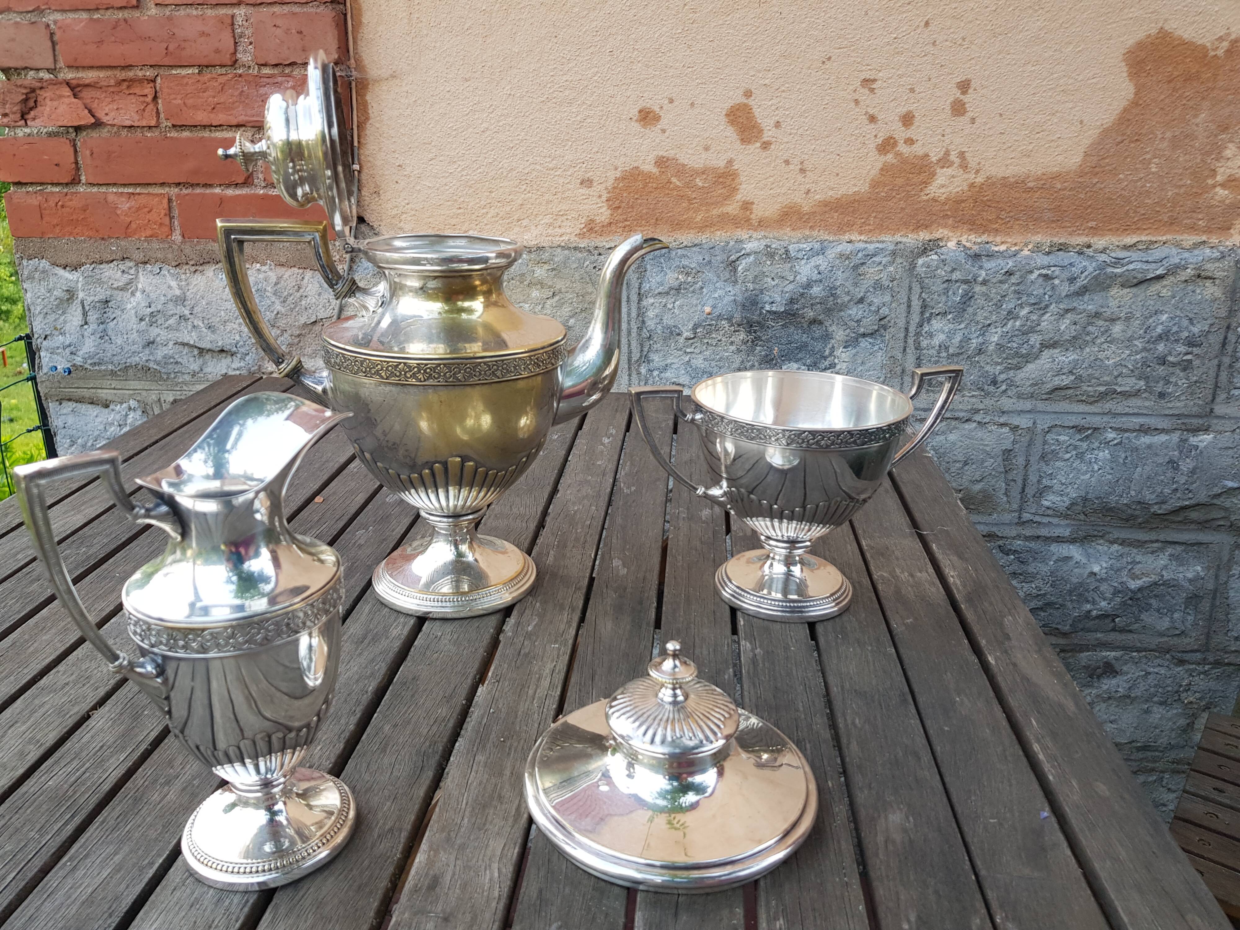 Silver metal coffee serving part