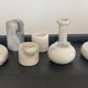 Series of 7 vintage Carrara marble candlesticks