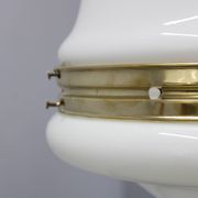 Pair of 1930s Peter Behrens Luzette pendants in opaline glass and brass