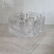 Candle holder or glass warmer with irregular ice effect.