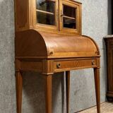 Cylinder desk topped with a Louis XVI style marquetry display case