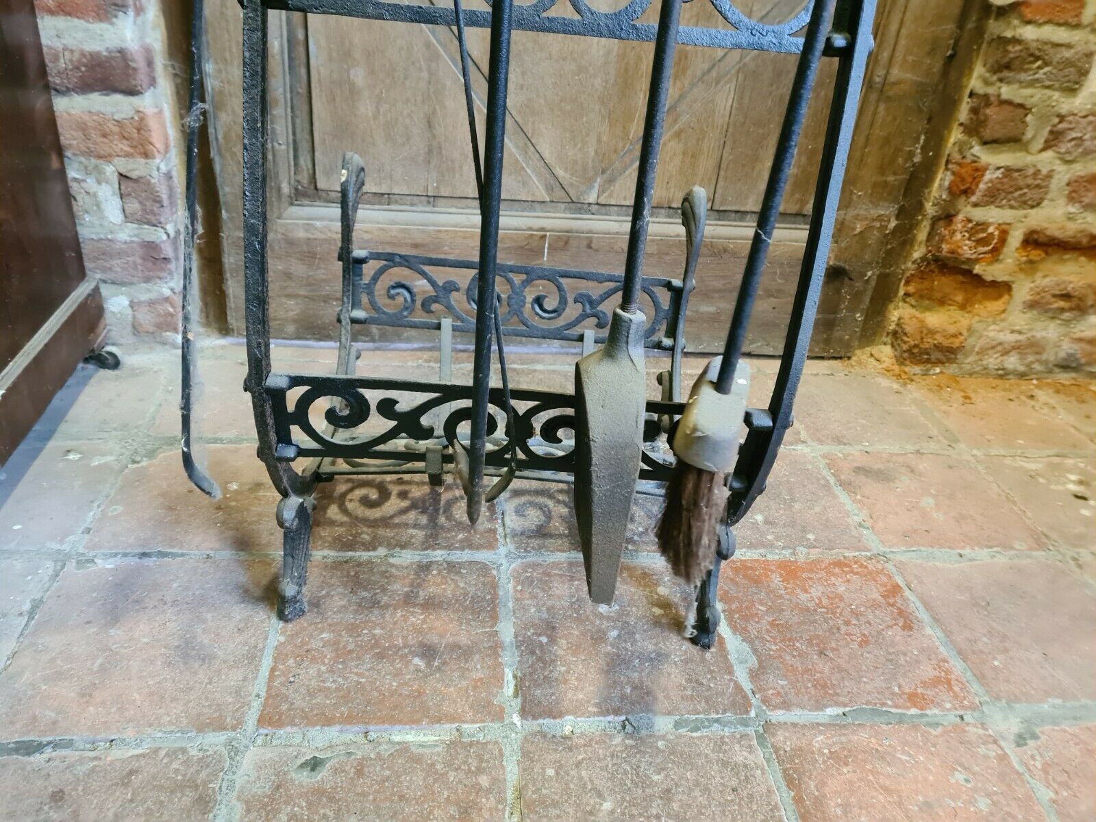 Fireplace, cast iron log holder