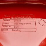 Red chair "selene" by vico magistretti for artemide of the 60s