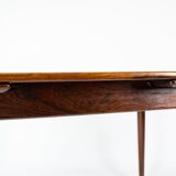 Dining table in rosewood with extensions from the 1960s