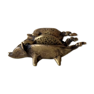 Stackable ashtrays in the shape of a pig