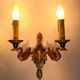 Pair of gilded bronze and green lacquer wall sconces by Maison Lucien Gau, Paris.