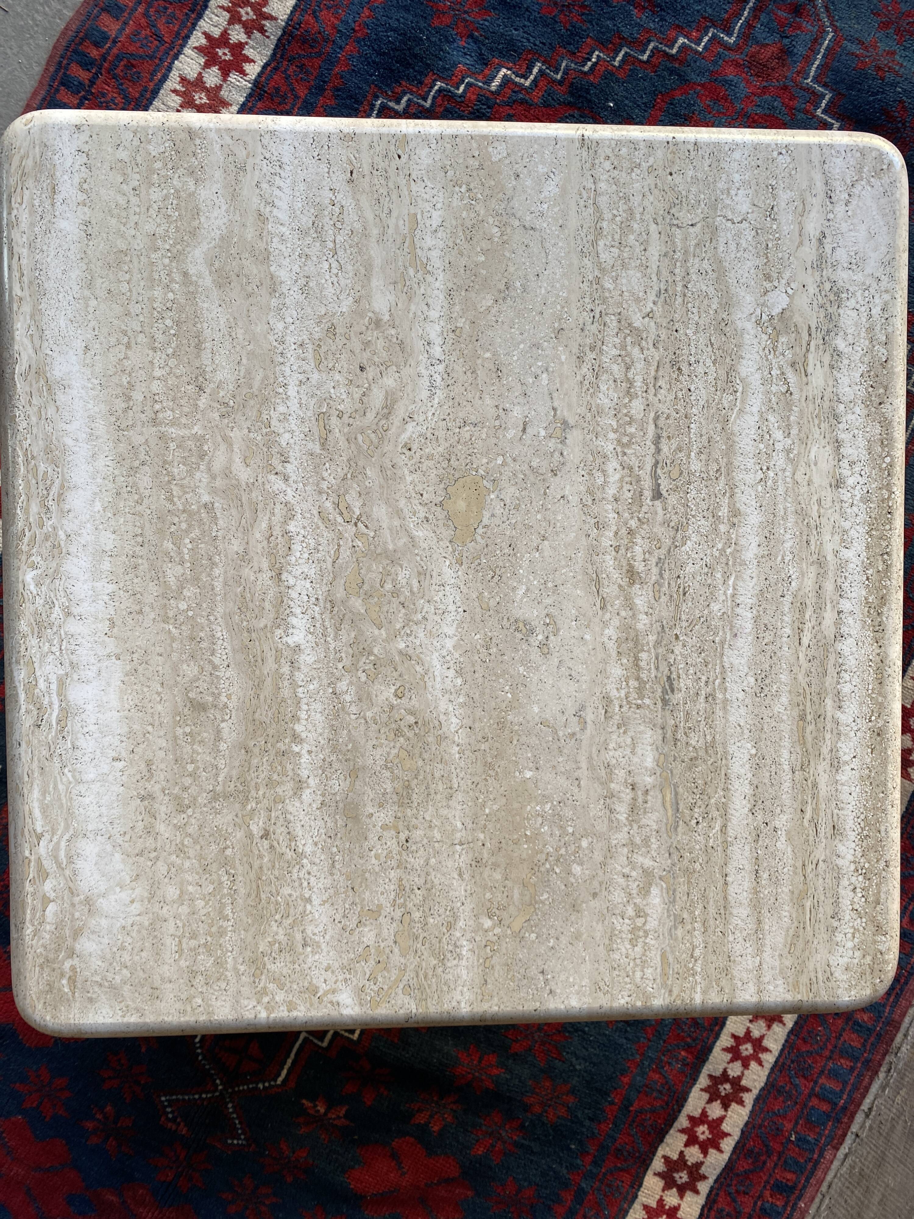 Coffee table in travertine