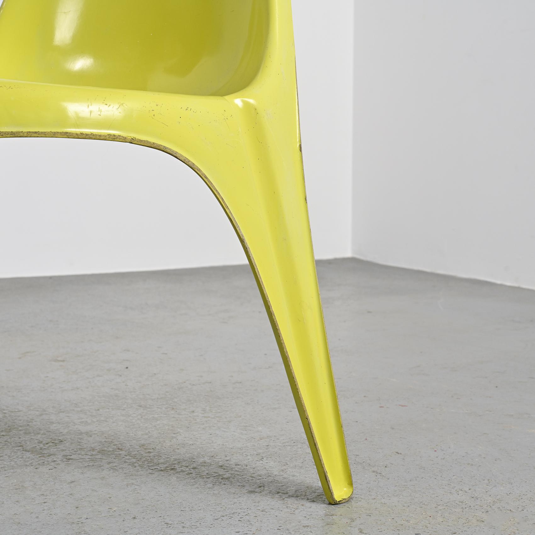Pair of yellow fiberglass tripod chairs by Walter Frey, circa 1968