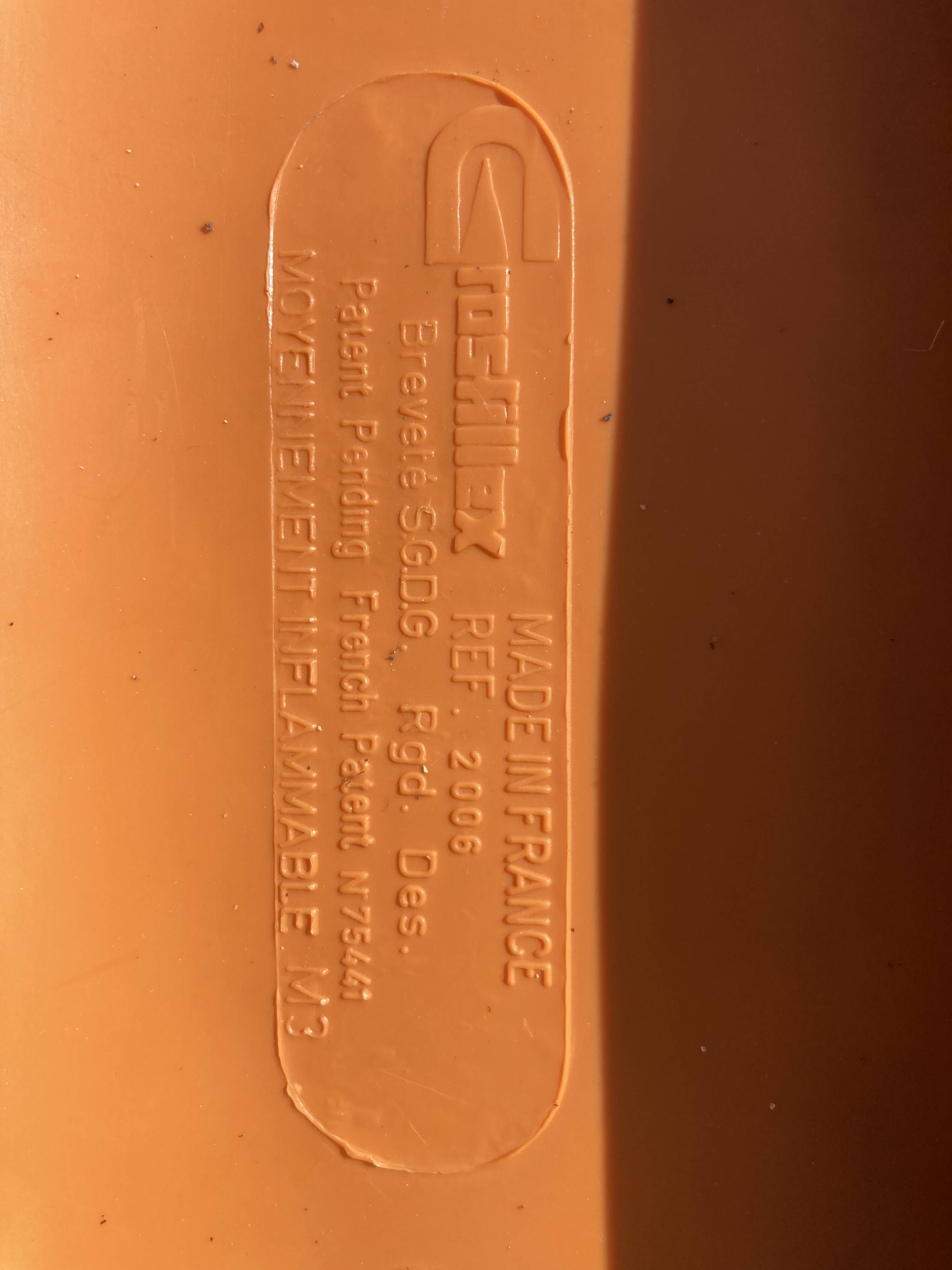 6 Grosfillex chairs from the 70s with orange shell.