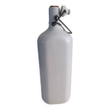 Stoneware bottle with cut sides