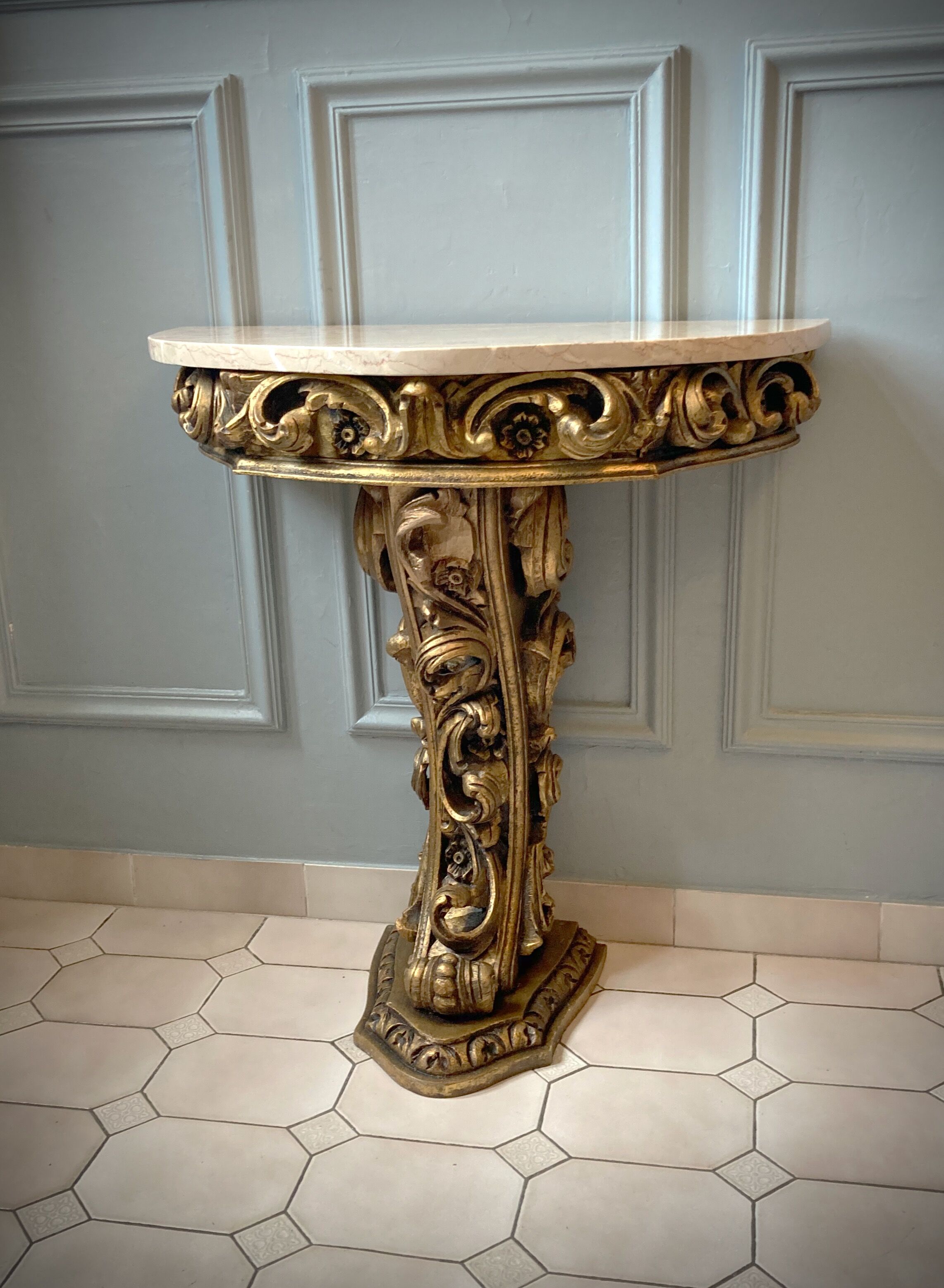 Carved wooden and marble console