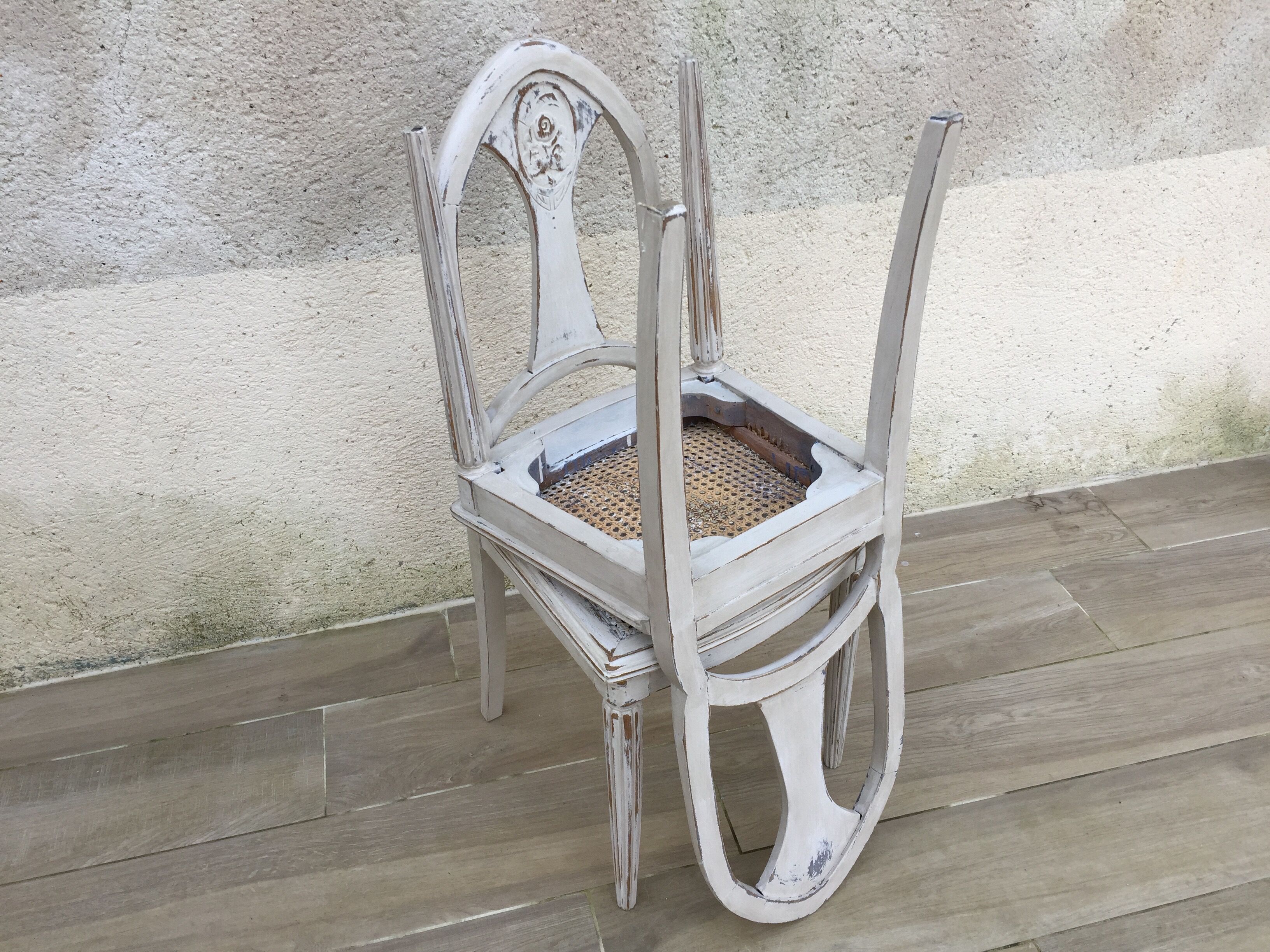 Pair of old white canne chairs