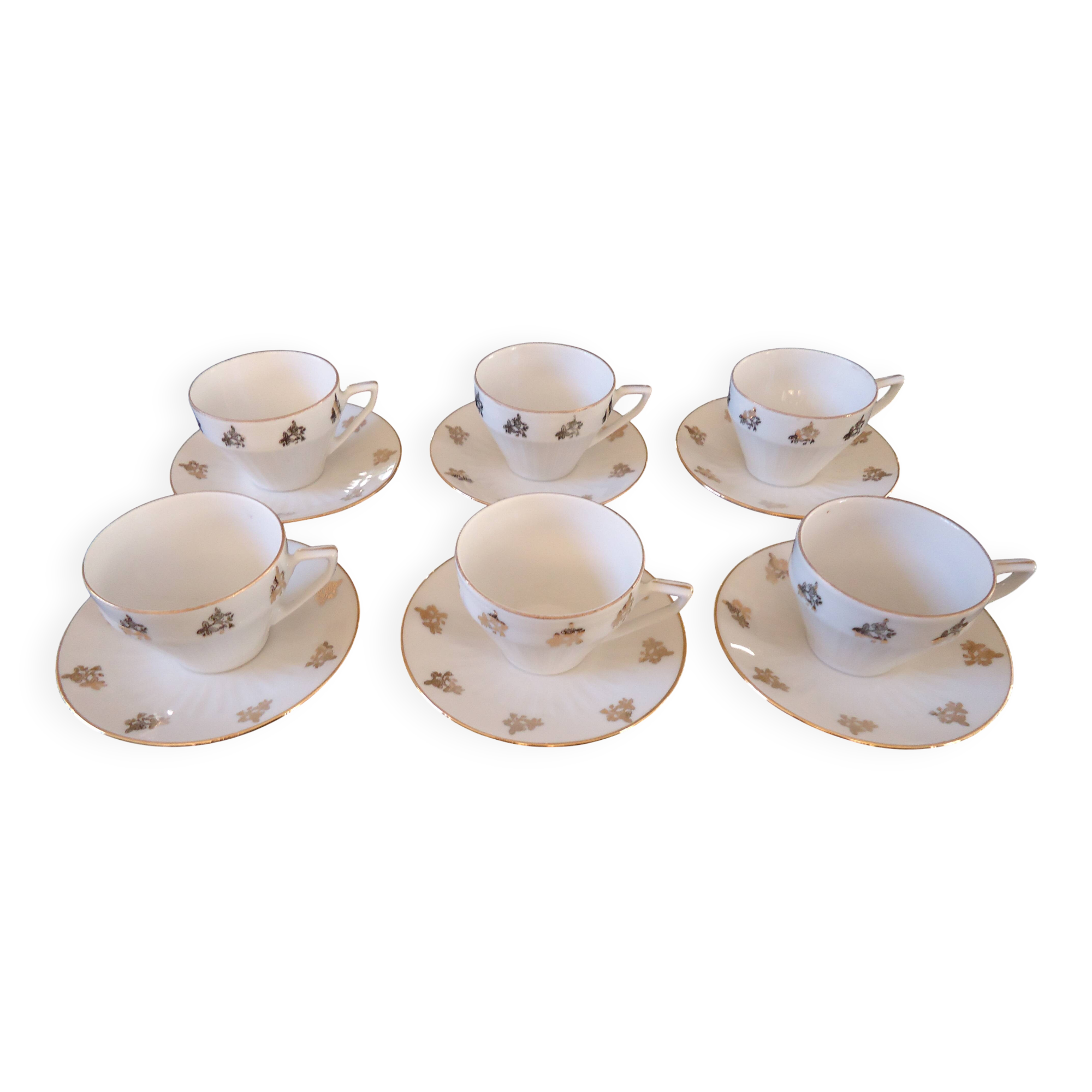 Set of six Art Deco white fine porcelain coffee cups and saucers