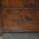 Large vintage hardwood furniture in military country style.