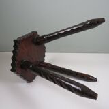 Vintage Spanish stool in carved wood with a leather seat.