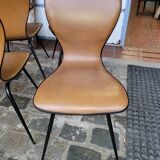 4 vintage chairs in skaï and metal base from the 60s