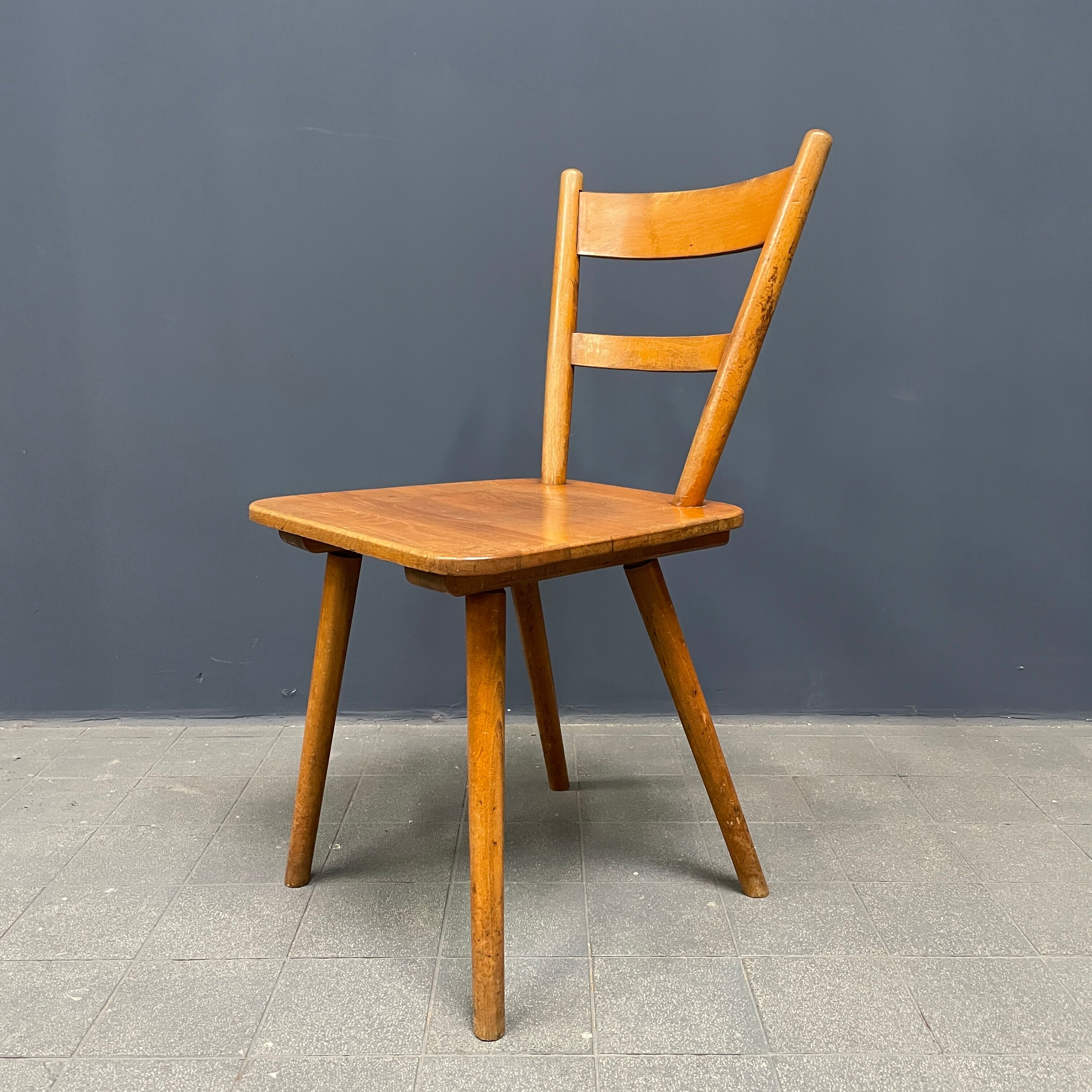 Set of eight german stick chairs from the 1950