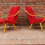 Pair of red armchairs model 6953 by Jaroslav Smidek published by TON