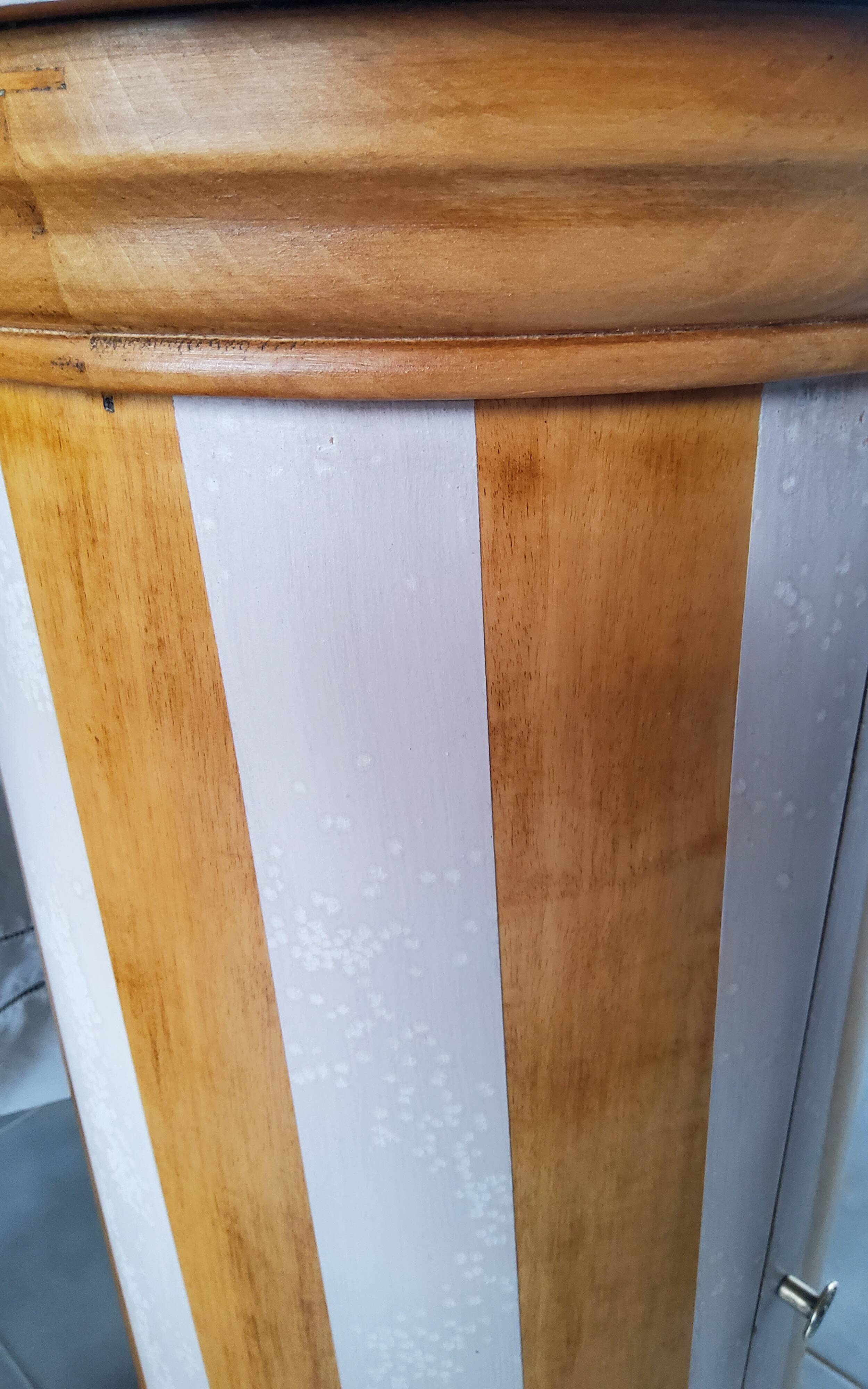 A pair of distressed bedside tables.