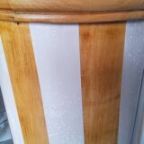 A pair of distressed bedside tables.