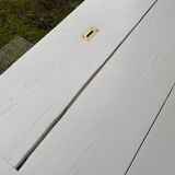 White counter with brass coin mechanism