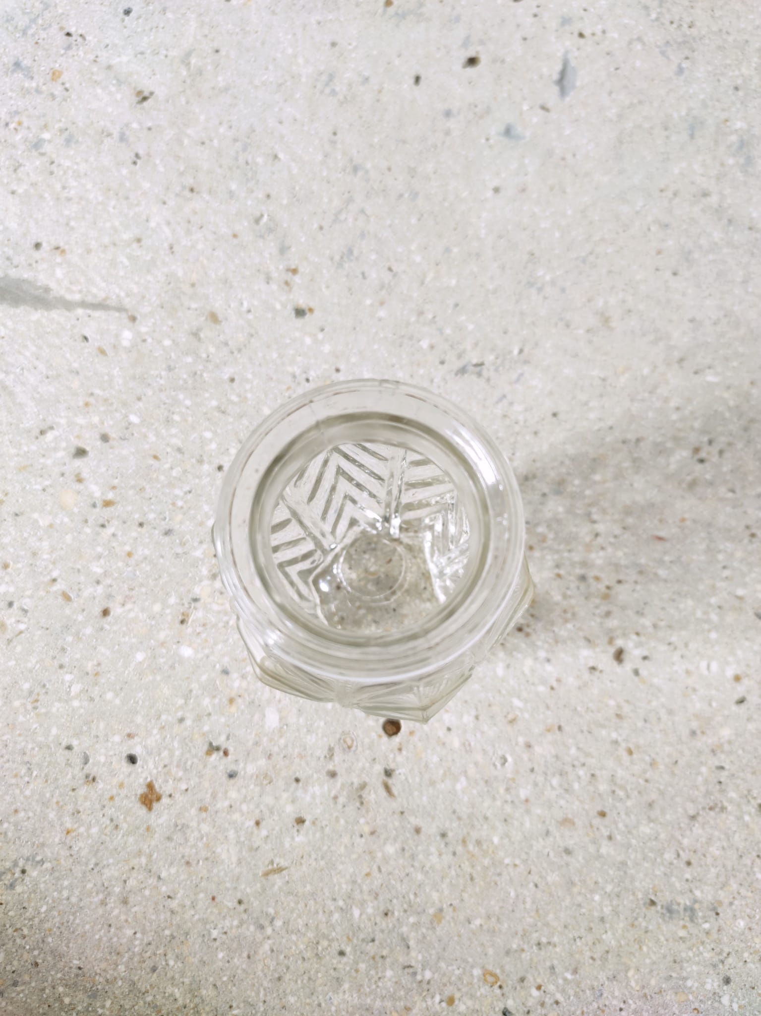 Small transparent molded glass vase