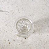 Small transparent molded glass vase