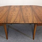 Scandinavian extendable round table in rosewood, 60s-70s