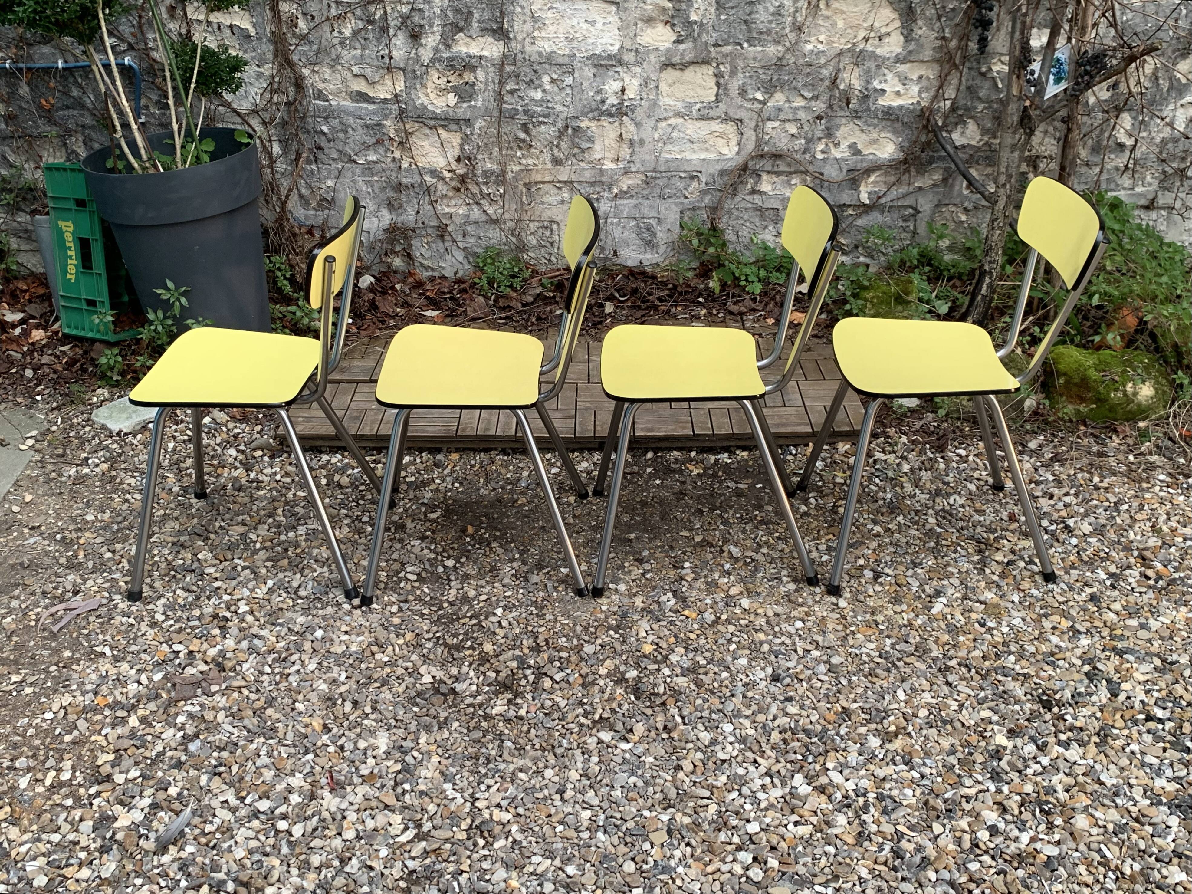 Yellow Formica chairs with compass legs, 1950s