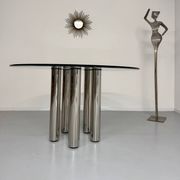 Round glass and metal dining table, Italian design from the 80s, vintage