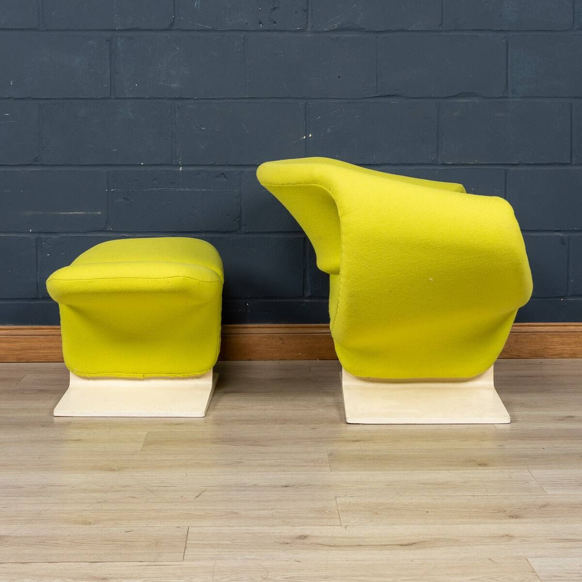 A 20thC RIBBON CHAIR & FOOTSTALL BY PIERRE PAULIN FOR ARTIFORT, FRANCE