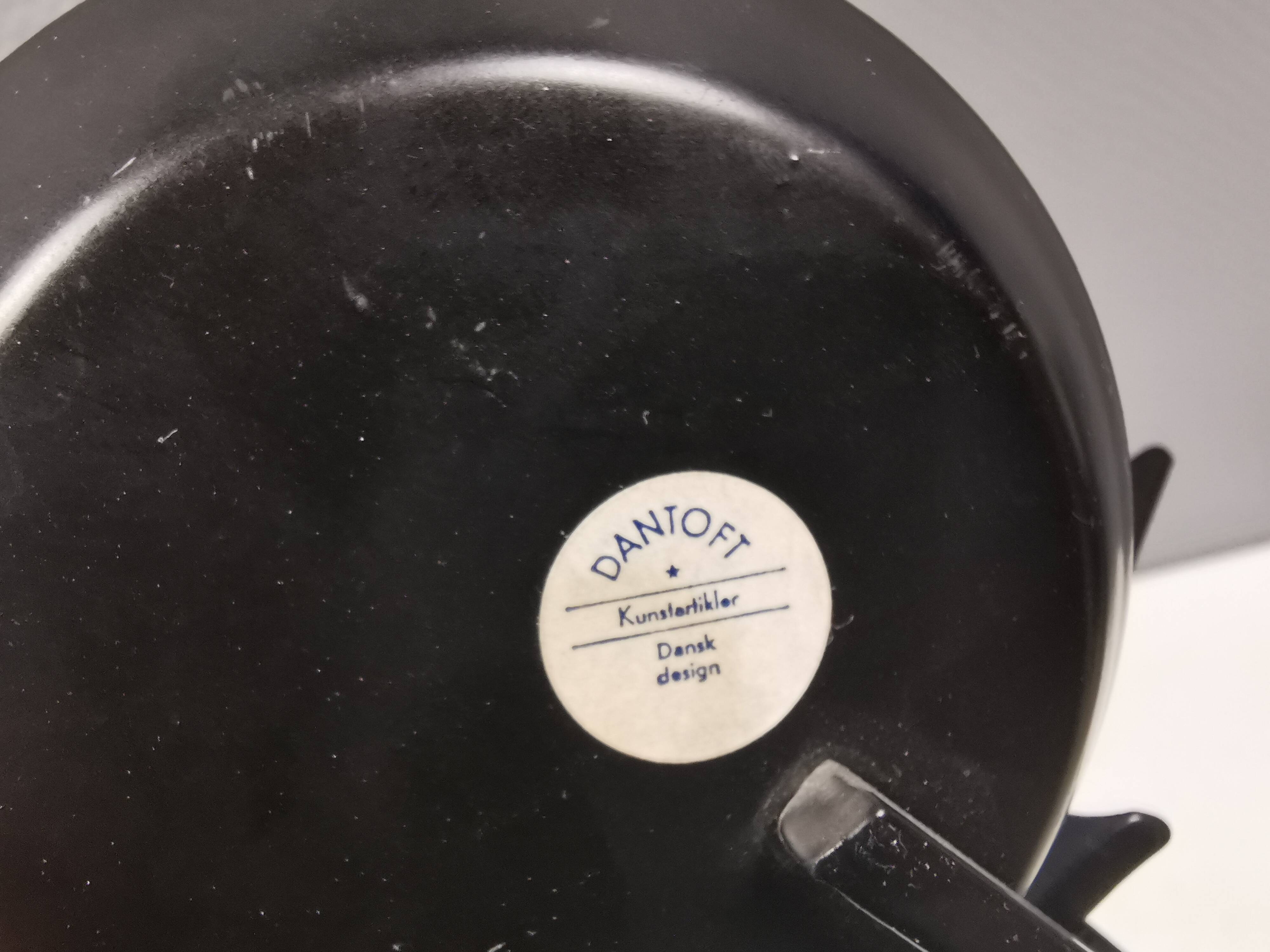 Vintage wall candle holder in wrought iron and hard pressed blue glass.