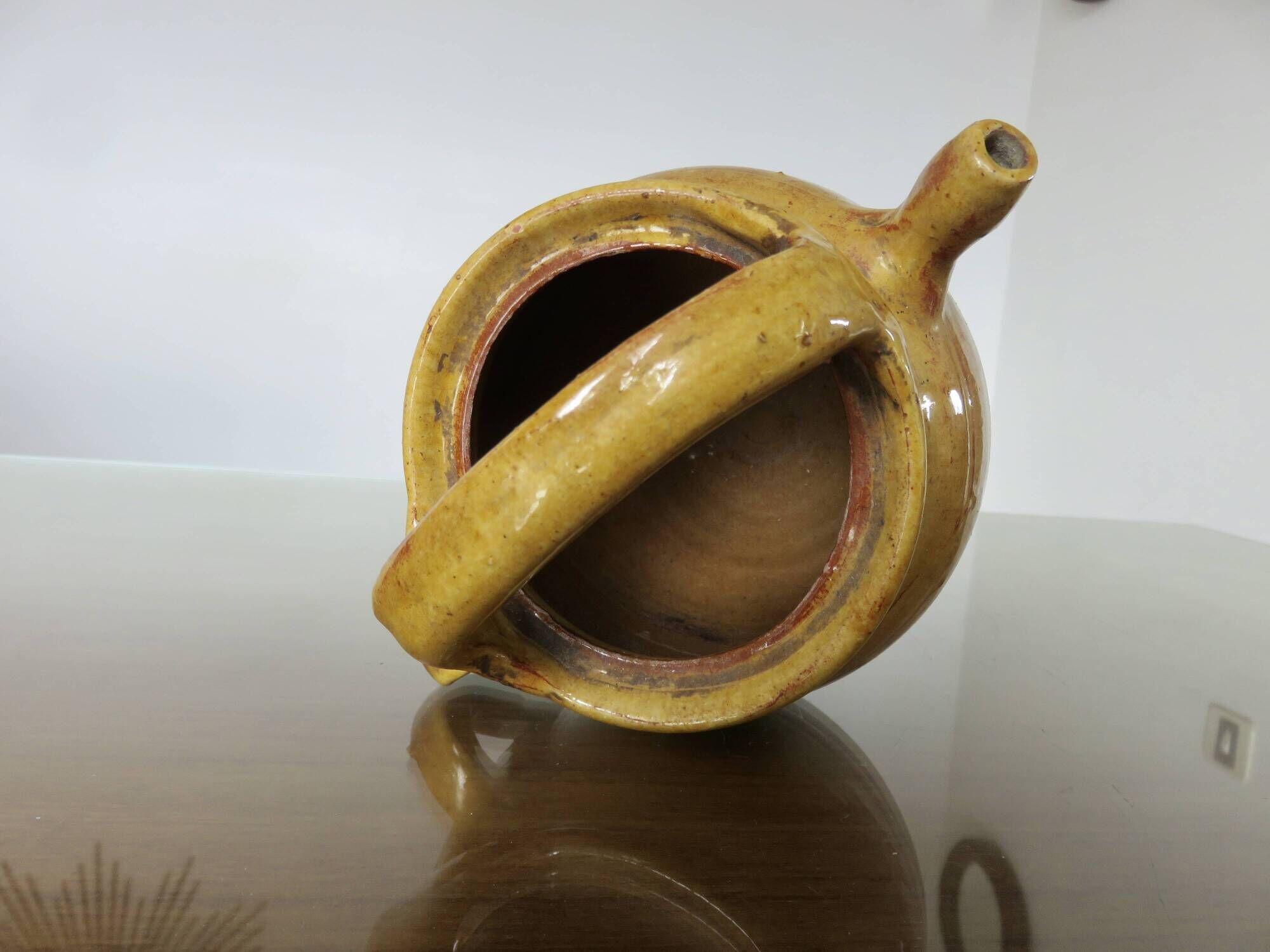 Glazed yellow terracotta jug, south-west of France.