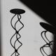 candlestick on wrought iron feet