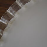 Dented opaline suspension