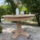 Extendable round table made of solid oak